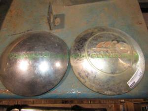 lot 110 image: Vintage mid century Plymouth hub caps
