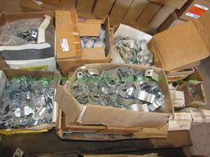 lot 107 image: Assorted electrical conduit connectors and hardware as shown, generous quantity