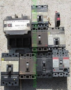 lot 63 image: Cutler Hammer and Square D industrial circuit breakers