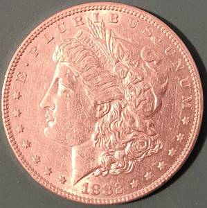 lot 1 image: 1882 MORGAN SILVER DOLLAR COIN AS SHOWN.