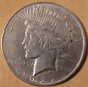 lot 31 image: 1927 D PEACE SILVER DOLLAR COIN AS SHOWN.