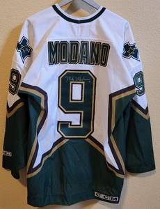 lot 40 image: GAME-WORN DALLAS STARS JERSEY SIGNED BY FORMER LEGENDARY STARS PLAYER AND HALL OF FAME MEMBER MIKE MODANO #9 AS SHOWN.