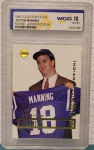 lot 61 image: 1998 COLLECTORS EDGE PEYTON MANNING ROOKIE AUTHENTIC EDGE WCG GEM-MT 10 FOOTBALL CARD IN PROTECTIVE HOLDER AS SHOWN.