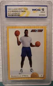 lot 62 image: 1993 CLASSIC DRAFT PICKS #104 SHAQUILLE ONEAL 92 FLASHBACKS WCG GEM-MT 10 BASKETBALL CARD IN PROTECTIVE HOLDER AS SHOWN.