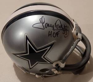 lot 92 image: RIDDELL DALLAS COWBOYS MINI HELMET SIGNED BY FORMER PLAYER AND HALL OF FAMER TONY DORSETT #33 AS SHOWN.