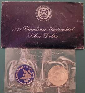 lot 99 image: 1971 UNCIRCULATED EISENHOWER SILVER DOLLAR COIN IN ORIGINAL MINT PACKAGING AS SHOWN.