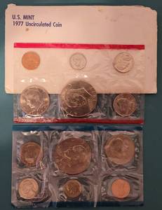 lot 101 image: LOT OF 2 1977 UNCIRCULATED MINT COIN SETS IN ORIGINAL MINT PACKAGING AS SHOWN. (YOUR BID X 2)