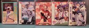 lot 115 image: LOT OF 5 SPORTS TRADING CARDS AS SHOWN. CECIL FIELDER, DAN MARINO, JOE MONTANA, BARRY SANDERS, AND LAWRENCE TAYLOR. (YOUR BID X 5)