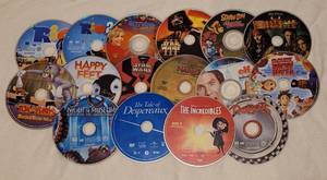 lot 131 image: LOT OF 16 DVD MOVIES WITHOUT CASES AS SHOWN.