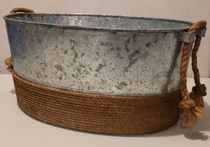 lot 133 image: GALVANIZED METAL STYLE BASKET IN STYLE, COLOR, AND CONDITION SHOWN. APPROX. 13 D x 19 W x 8.75 H.