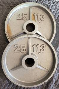 lot 143 image: LOT OF 2 BARBELL WEIGHT PLATES AS SHOWN. 25 LBS EACH. (YOUR BID X 2)