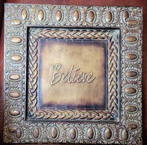 lot 155 image: EMBOSSED METAL WALL DECOR FRAME IN STYLE, COLOR, AND CONDITION SHOWN. APPROX. 16 x 16.