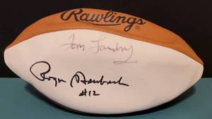lot 171 image: RAWLINGS FOOTBALL SIGNED BY COWBOYS LEGENDS AND HALL OF FAMERS ROGER STAUBACH #12 AND COACH TOM LANDRY AS SHOWN.