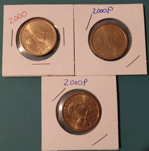 lot 210 image: LOT OF 3 SACAGAWEA DOLLAR COINS AS SHOWN. (YOUR BID X 3)