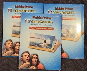 lot 229 image: LOT OF 3 MOBILE PHONE VIDEO AMPLIFIER ENLARGED SCREEN MAGNIFIER IN UNOPENED BOXES AS SHOWN. (YOUR BID X 3)
