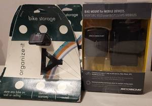 lot 244 image: (3) BIKE STORAGE MOUNTS AND (1) BIKE MOUNT FOR MOBILE DEVICES IN PACKAGES AS SHOWN.