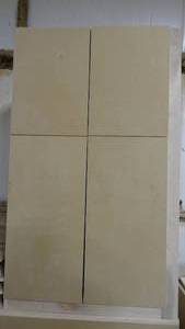 lot 34 image: 4-Door Wall Cabinet w Shelving & Dividers.  Measures 54.75 x 32.75 x 24.75