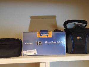lot 49 image: Canon power shot S2-15 digital camera in original box miini tri pod and cassette recorder