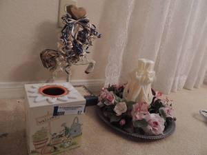lot 57 image: Painted tissue box, hand carved white candle covered in greenery 15 wooden carousel horse on stand
