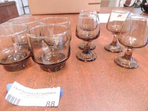 lot 88 image: 4 3 champagne glasses brown glass and 4 mini 3 glasses