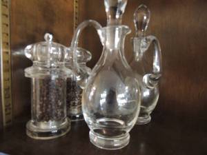 lot 92 image: 2 crushed pepper shakers oil and vinegar decanters with tops all new