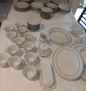 lot 113 image: Noritake 2160 Eugenia Dinner set includes- 12 dinner plates,12 saucers,12 soup bowls, 12 bread plates,12 dessert, 12 coffee mugs, platter 9x9, platter,16x12  soup tureen, sugar & creamer, S&P shakers covered butter dish & gravy boat  81 pcs