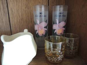 lot 119 image: Brown glasses x 2    Speckled gravy boat ,  2 celebrity cruise drink glasses