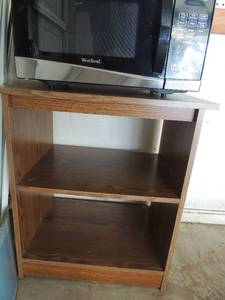 lot 126 image: west bend microwave on table 2 tier shelving 26x24x15