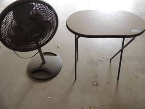 lot 132 image: Laske oscillating  fan and gray fold up TV table