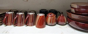 lot 136 image: SANGO -AVANTI BROWN DINNER SET #4722  11 DINNER PLATES X 7,  6 SAUCERS X8, SOUPCEREAL BOWLS X 7, LG. SERVIVING BOWL, CUPS X 7. CREAMER, COVERED SUGAR BOWL, 32 PCS  PLUS COFFEE CUPS & BROWN BOWL