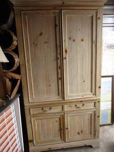 lot 37 image: LARGE 4-Door, 2 Drawer, Entertainment Center, With Raw Wood Look.