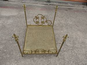 lot 12 image: Vintage Gold Tone- Metal Fireplace Wood Rack, In fleur-de-lis Pattern