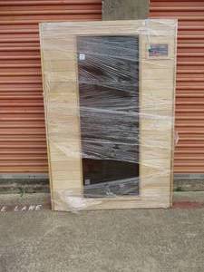 lot 86 image: Unused- Maxxus Saunas, Sauna Glass Door In Wooden Frame With Control Panel.