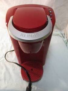 lot 106 image: KEURIG- Model K-Compact K35 Single-Serve K-Cup Pod Coffee Maker, Imperial Red