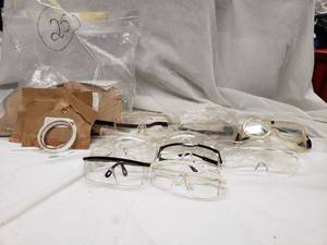 lot 215 image: Tape seal, and large lot of safety Glasses