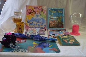 lot 175 image: Princess folding chair, Disney Books - The Princess Encyclopedia and Peter Pan, Frozen Diary and Pencil Bag,
