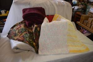 lot 178 image: 2 Crocheted Baby Blankets, Fleece Throw Blanket, Round Tablecloth and mattress Cover