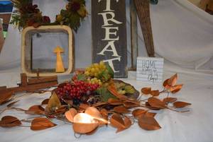 lot 148 image: Decorative Items, Old Window Frame, Wreath, Trick or Treat Front Porch Sign, Plastic Grapes, Copper Leaf Wall Art