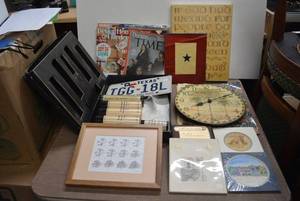 lot 190 image: Texas License Plate, Wall Clock, Small Prints, Leather Cleaner, Service Flag Banner as shown