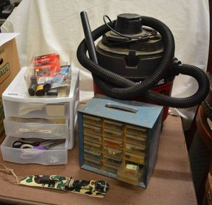 lot 192 image: 8 Gallon WetDry Vac, Survival Knife, Variety of Disc Batteries, Small Hardware Bin