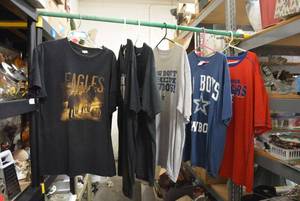 lot 200 image: Texas Cowboy and Ranger T-Shirts, Eagles Concert T-shirt, Beth Hart Concert T-shirt, Fudpuckers T-shirt