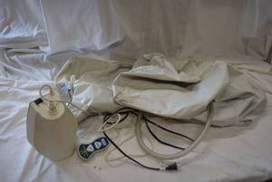 lot 228 image: Mattress Genie Model 50-600 Air Pump with Remote for King Size Bed
