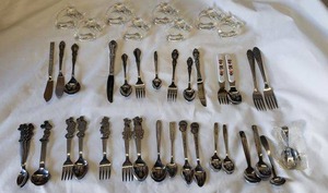 lot 128 image: Childrens Stainless Silverware ( Disney Characters, Mickey & Minnie Mouse, Donald and Pluto and Onieda) and Glass Horse Napkin Rings