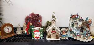 lot 15 image: Winter Scene Snow Globe, Church Votive Candle Holder, Desk Clock and More
