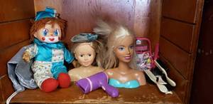 lot 65 image: Clown Baby Doll, 2 Doll Busts with Brushable Hair and Accessories one is Barbie