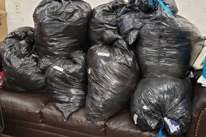 lot 67 image: Large Lot of Mens and Womens Clothes