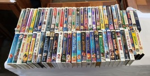 lot 72 image: Disney and Childrens VHS Movies, many are unopened