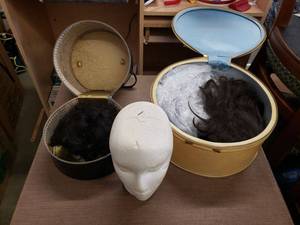 lot 99 image: 2 Zippered Wig Cases with Wigs and Styrofoam Head