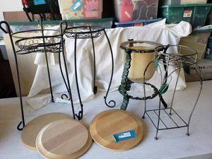 lot 98 image: Wire Plant Stands and Giant Cast Iron Candle Votive with Candle