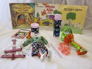 lot 179 image: Winnie the Pooh Albums, Dandelions Album, Clown Puppet, Soup and Water Bottle, see pictures
